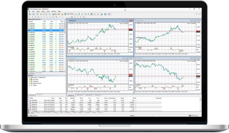 MetaTrader 4 platform charts displayed on notebook