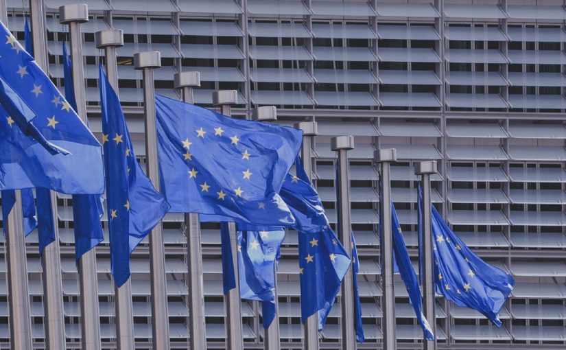 EU waving flags, E-Global gets European license